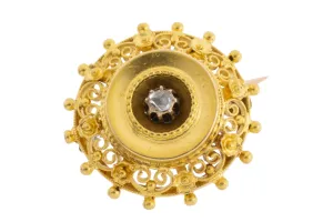 Filigree brooch with rose diamond in 14 carat gold