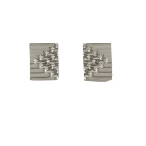 platinum tex rex studs