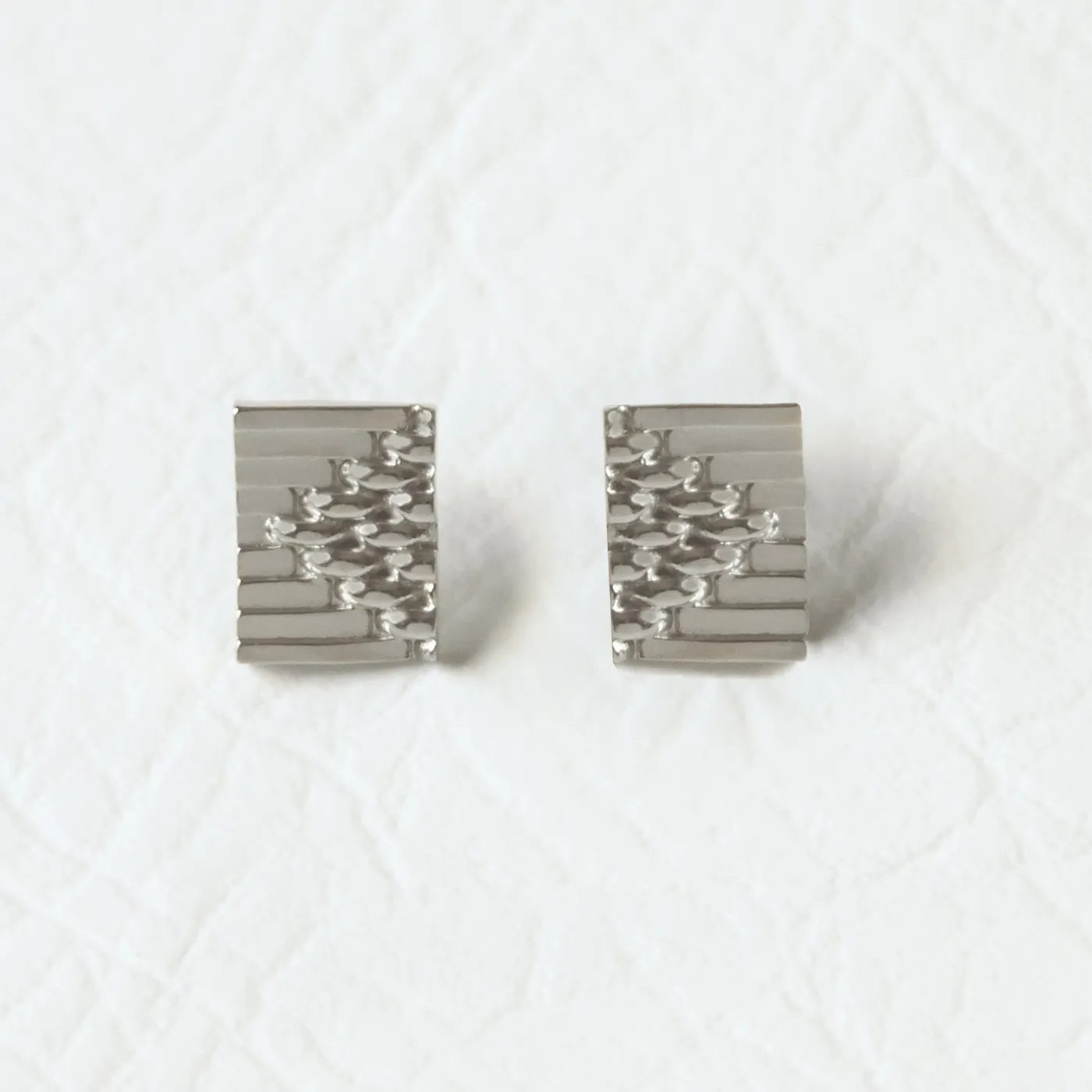 platinum tex rex studs